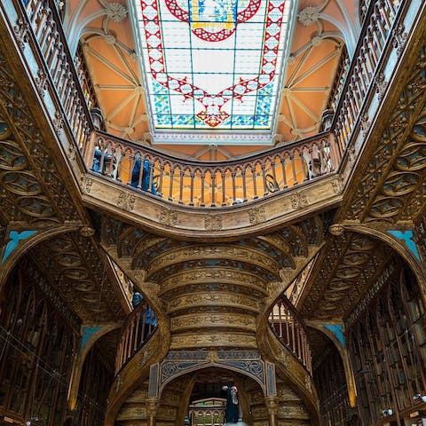 Admire the intricate architecture of Livraria Lello before picking up a bestseller