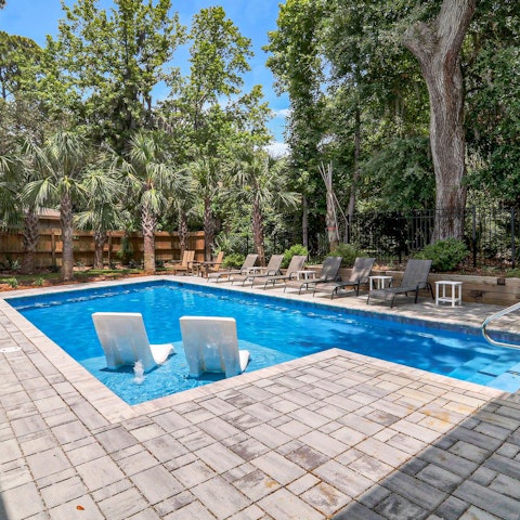 Savour leisurely afternoons lounging by the pool