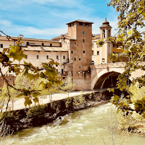 Cross the old bridge to Isola Tiberina, a thirty-five-minute bus ride away