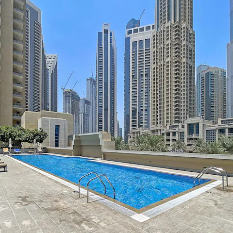Slip into the shared outdoor pool for a few refreshing laps