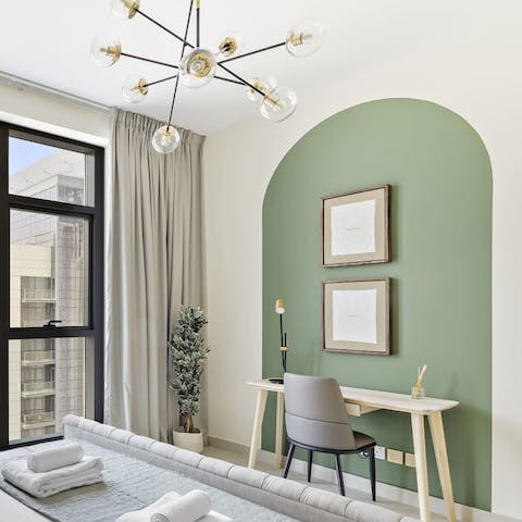 Fire off emails from the bedroom's sleek desk space