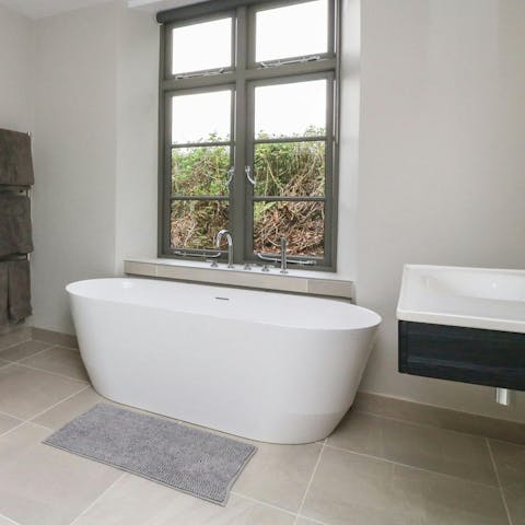 Soak in the freestanding bath after a day of outdoor adventures