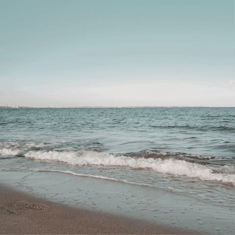 Drive down to the sandy shores of Belediye Halk Plaji