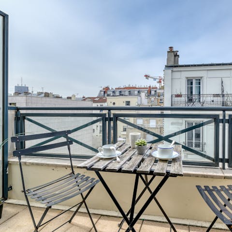 Enjoy coffee and French pastries on the balcony