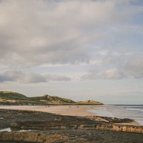 Take a picnic to North Sunderland Beach, an eighteen-minute walk away, and watch the waves roll in