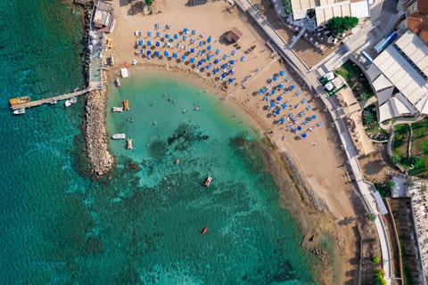 Stroll over to Vryssi Beach and relax on the sand