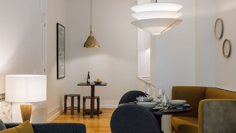 Share a bottle of Portuguese wine around the intimate dining table