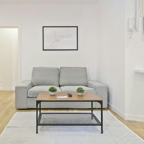 Unwind in the tranquil living space after a day of visiting galleries and museums