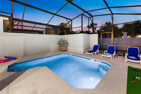 Cool off in the pool as the Florida sky turns pink