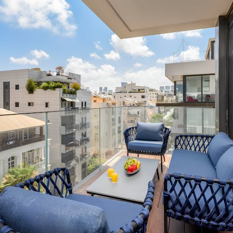 Sip a café hafuch on the sunny balcony