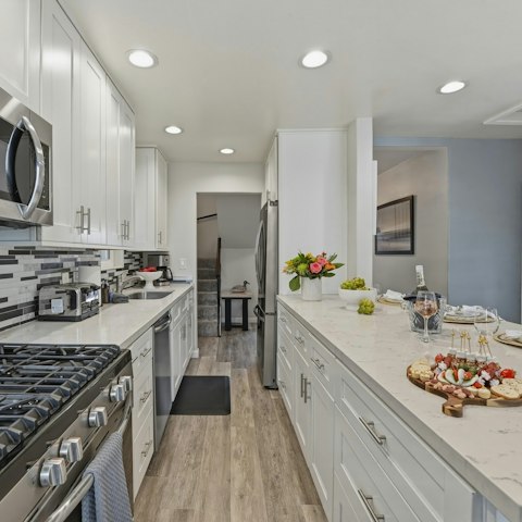 Rustle up waffles and coffee in the fully–equipped kitchen