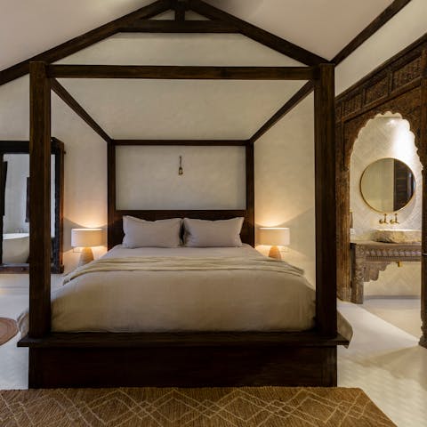 Get some rest in the four-poster bed after the perfect day in Koh Samui