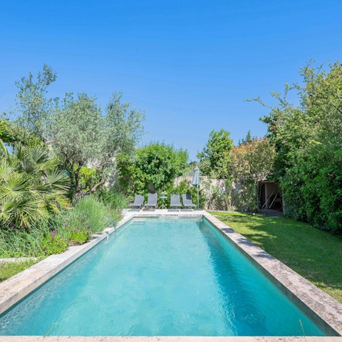 Relax in the French sun next to the private pool