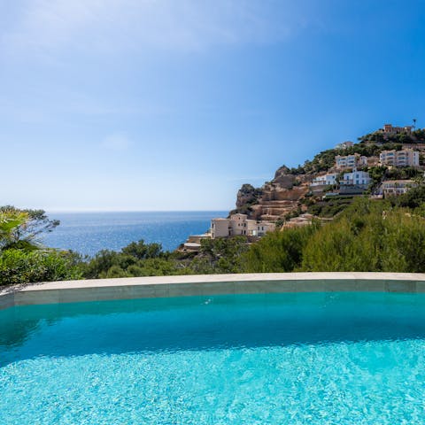 Swim in the private pool as sea views stretch before you