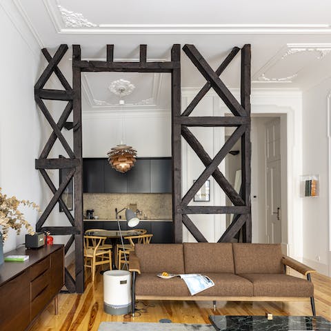 Kick back in the stylish living room with a glass of wine after a day of Lisbon sightseeing