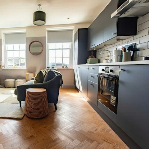 Relax in the modern living space with a glass of English wine