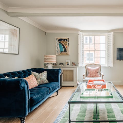 Pour a glass of wine and unwind in the stylish living room