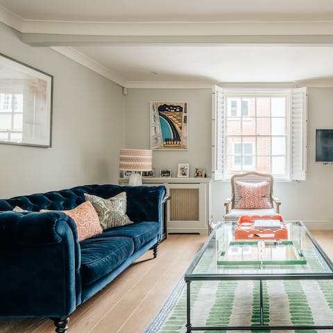 Pour a glass of wine and unwind in the stylish living room