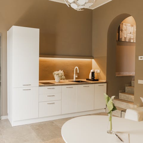 Dine indoors or outdoors after preparing snacks in the convenient kitchen