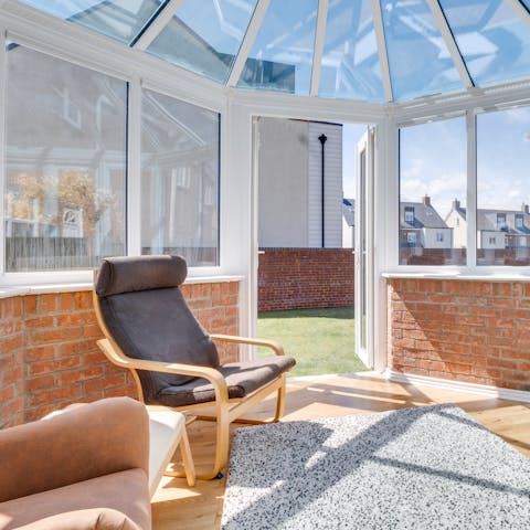 Chill in the conservatory on the comfy chairs