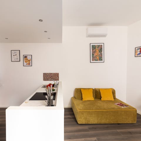 Unwind in the stylish, open-plan living and dining area