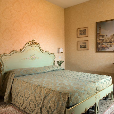 Get some rest in the comfy bed with its ornate bedhead