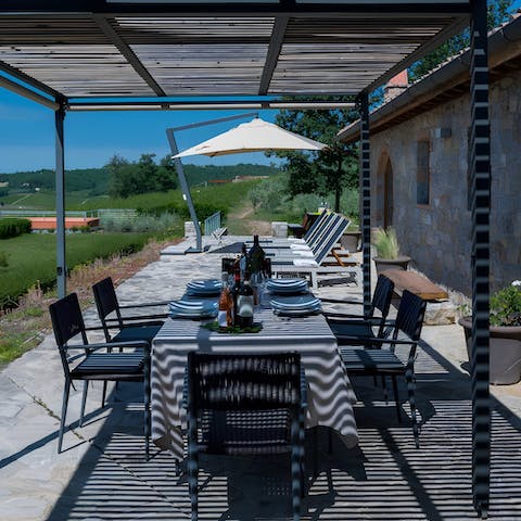 Take a seat at the dining table and enjoy your supper in the fresh air