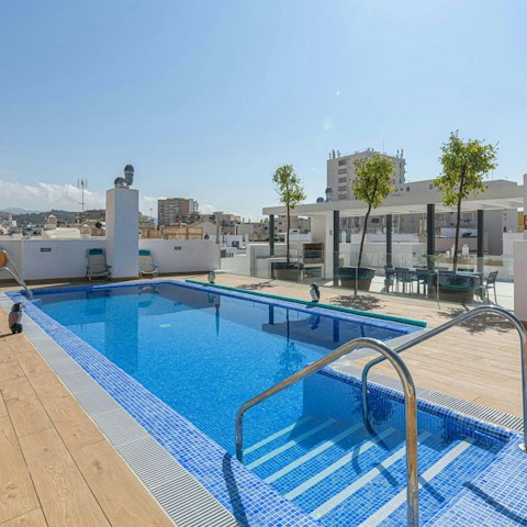 Cool off in the communal rooftop pool