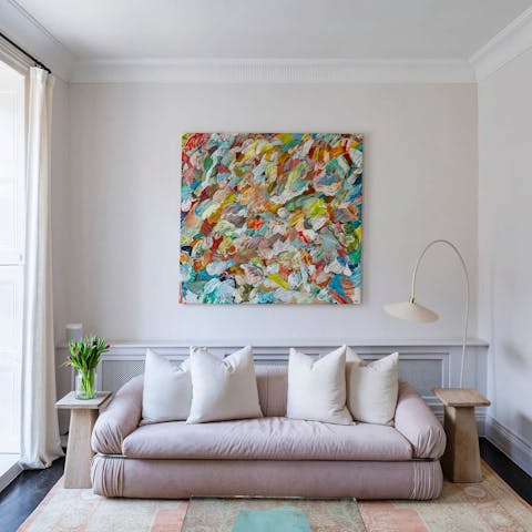 Get comfy on the plush sofa and put your feet up for chilled nights in