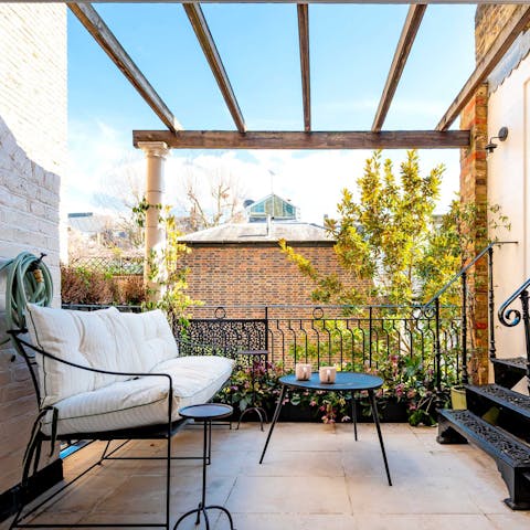 Relax on your private terrace, sipping on wine and enjoying the last of the afternoon sun