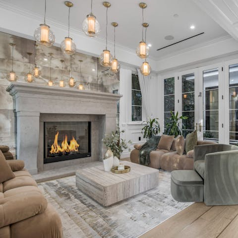 Pour the drinks and get cosy by the fire in the living room