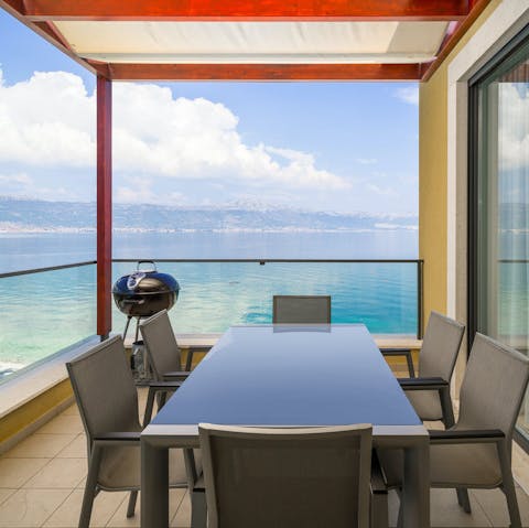 Enjoy an alfresco dinner with a sea view