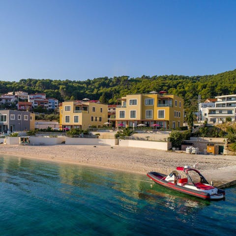 Wander down to the pebbly beach, just a minute away