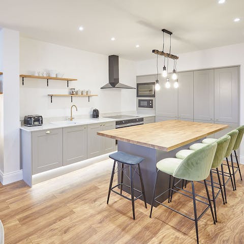 Savour delicious meals rustled up in the minimalist kitchen