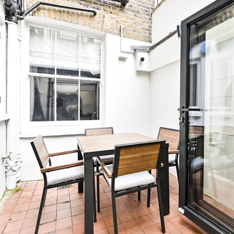 Enjoy a few sundowners in the courtyard patio
