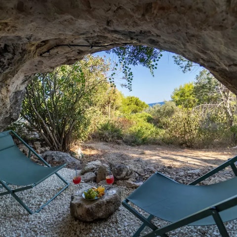 Take the garden path down to the natural cave – perfect for some quiet reading