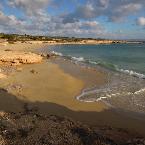 Stroll down to Ammos Beach in ten minutes and lounge on the golden sands