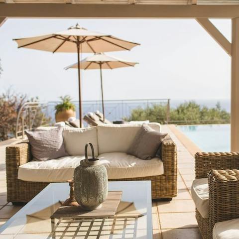 Sip on a glass of wine in the luxurious outdoor space