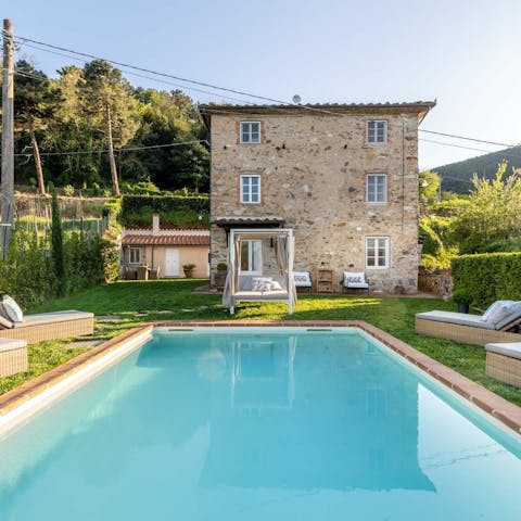 Float in the waters of the private pool and dry off in the sun