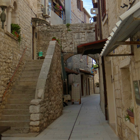 Wander the windy streets of nearby Umag