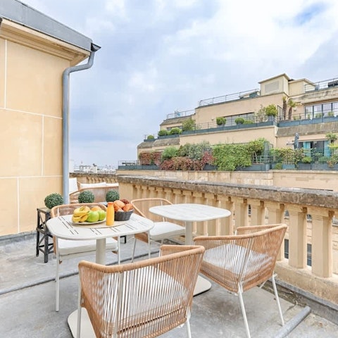 Enjoy a glass of Champagne on the private terrace