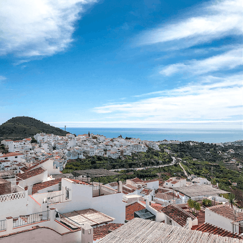 Take a stroll through the whitewashed streets of Frigiliana