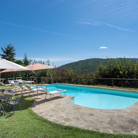 Drink in the views of the valley by the sun-drenched swimming pool
