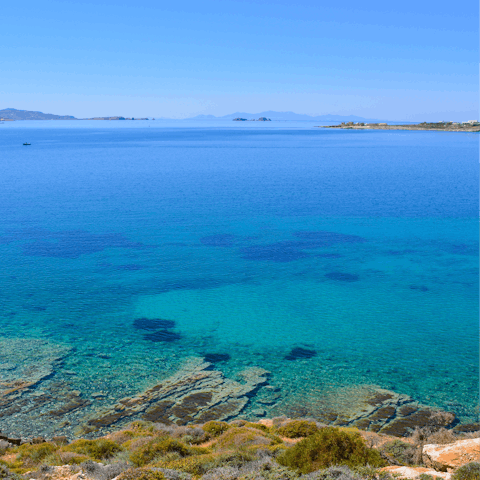 Paddle at nearby Ambelas beach – it's a short drive away