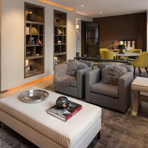 Cosy up the plush living room, after a day of exploring the sights of London