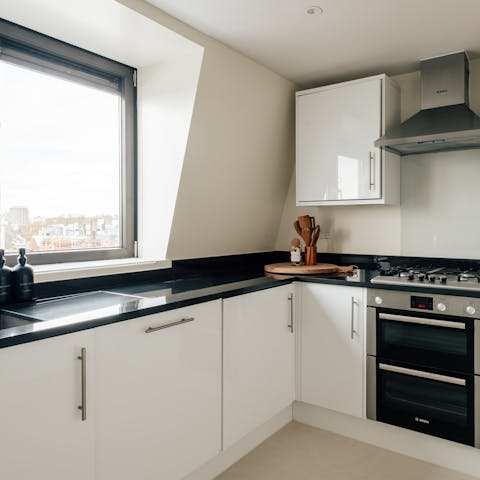 Fire up the coffee pod machine in the well-equipped kitchen