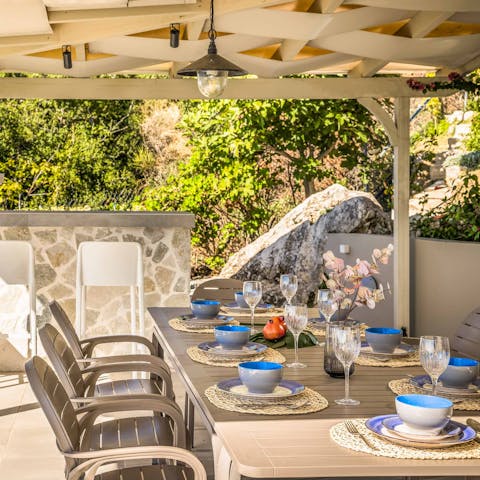 Cook up a feast using the wood-fired oven and dine alfresco