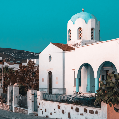 Explore the island, where the village of Pyrgos awaits three kilometres away