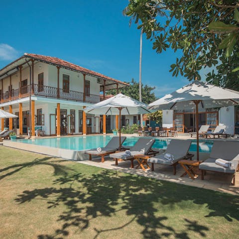 Spend your days drifting between the pool and a sun lounger