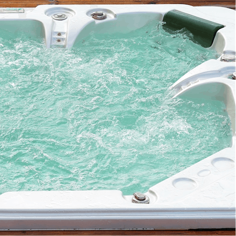 Soak in the sunken hot tub